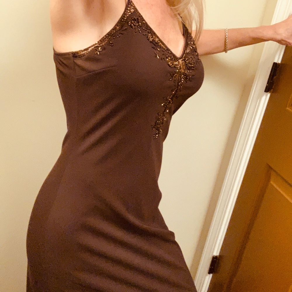 Brown long party dress with sequence accents.